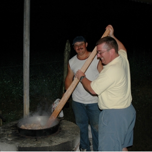 Costa Rica  country tradition- cooking Chicharrones over wood fire